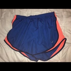Blue and orange Nike tempo dri fit shorts